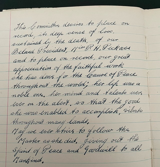 Photograph of handwritten obituary in the WLPA's minute book